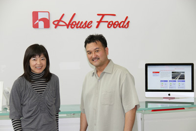 IN-HOUSE STAFF: Yoko Difrancia and Glenn Yonemura in the House Foods lobby.